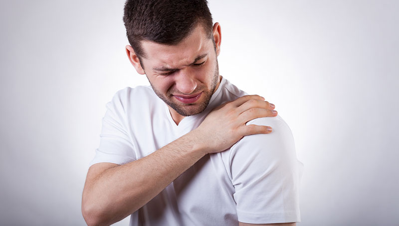 Man with frozen shoulder and shoulder pain